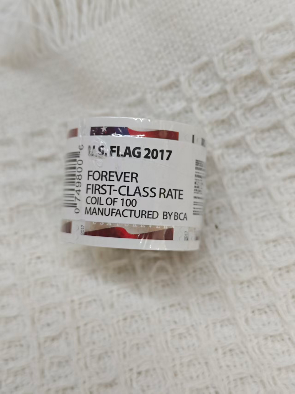 One roll of USPS stamps, 100 brand new